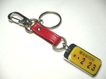 �I���W�i���i���o�[�v���[�g�L�[�z���_�[�Z���^�[