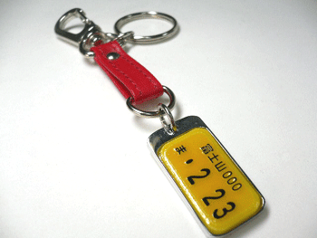 �I���W�i���i���o�[�v���[�g�L�[�z���_�[�Z���^�[